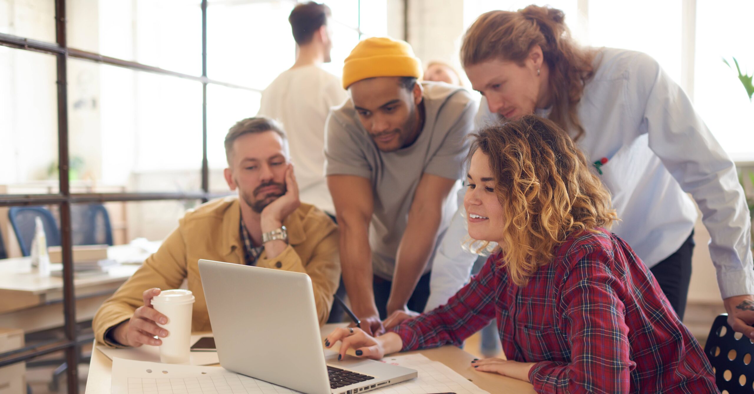 Group of people exploring the web design trend in 2024